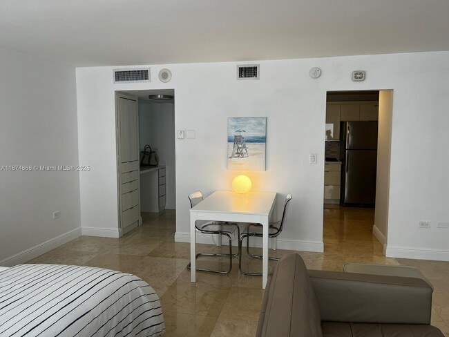 Building Photo - 5555 Collins Ave Unit 5P Rental