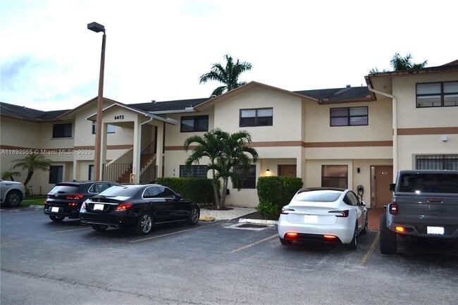 Building Photo - 6475 SW 129th Pl Unit 409-4