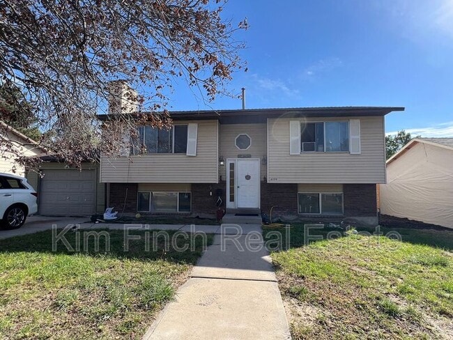 Building Photo - 6099 S Country Hills Drive Unit BASEMENT