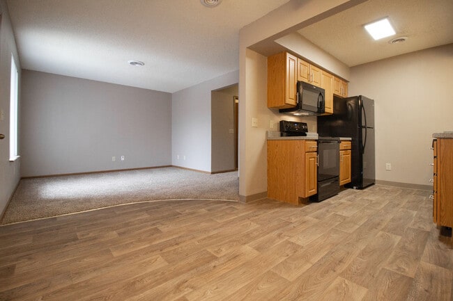 Wood-Style Flooring at Delaware Crossing - Delaware Crossing Apartments & Townhomes