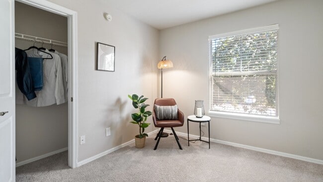 Create your perfect space in this serene and stylish bedroom with plush carpeting, a spacious closet, and a large window for natural light.