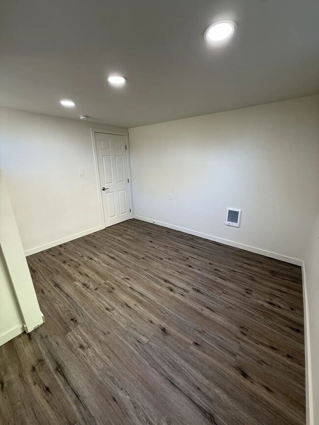 Photo - Newly Renovated Basement Unit with Private Fully Fenced Back Yard and Exclusive Parking Area