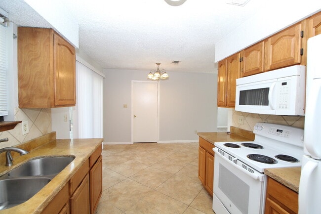 Photo - West Pensacola Rental with 3 Bedrooms, Privacy-Fenced Yard, Indoor Laundry Room & Easy Access to ...