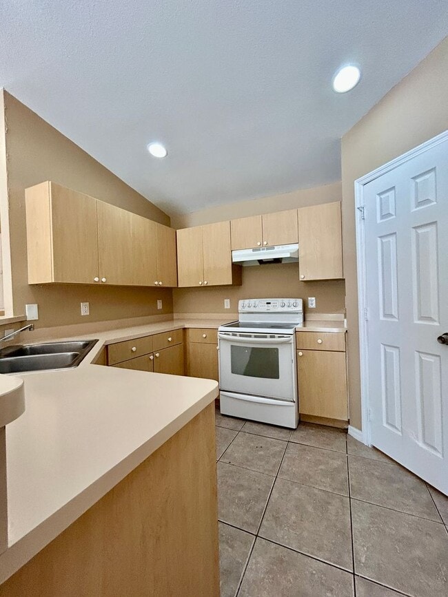 Building Photo - Lehigh Acres Duplex Rental 3BR/2Bath | Tile Floors Throughout + Lawn Care Included