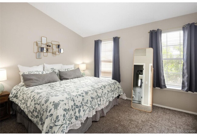 Bedroom 2 with bathroom - 10587 W Maplewood Dr