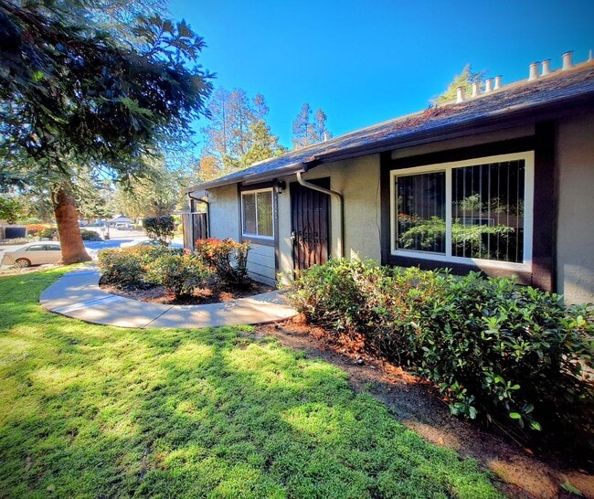 Building Photo - Spacious 2bd First Floor Condo W/Private Patio, Attached Garage, & Private Laundry Room