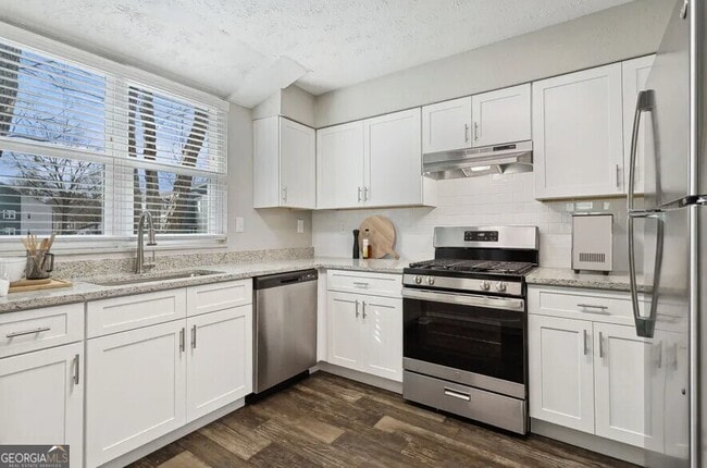 Building Photo - 7600 Roswell Rd Unit 01-1503 Rental