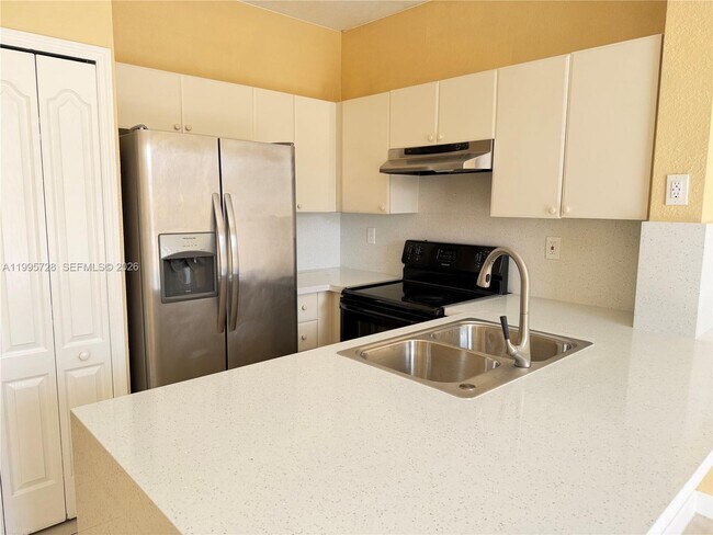 Photo - 7080 NW 177th St Unidad 209-13