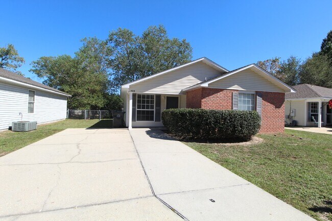 Photo - Well-Maintained 3BR Home in Bay Pine Villa Near NAS Pensacola with Open Layout & Private Backyard