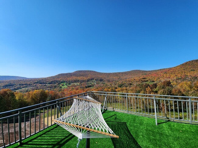 Photo - Modern Mountain Retreat with Rooftop Hot T...