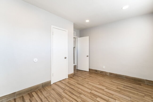 Photo - Chic Wood-Floored Haven with Carport!