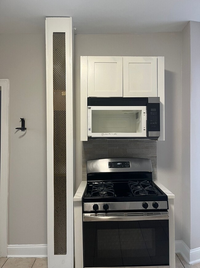 Building Photo - 6129 Park Ave Unit D2