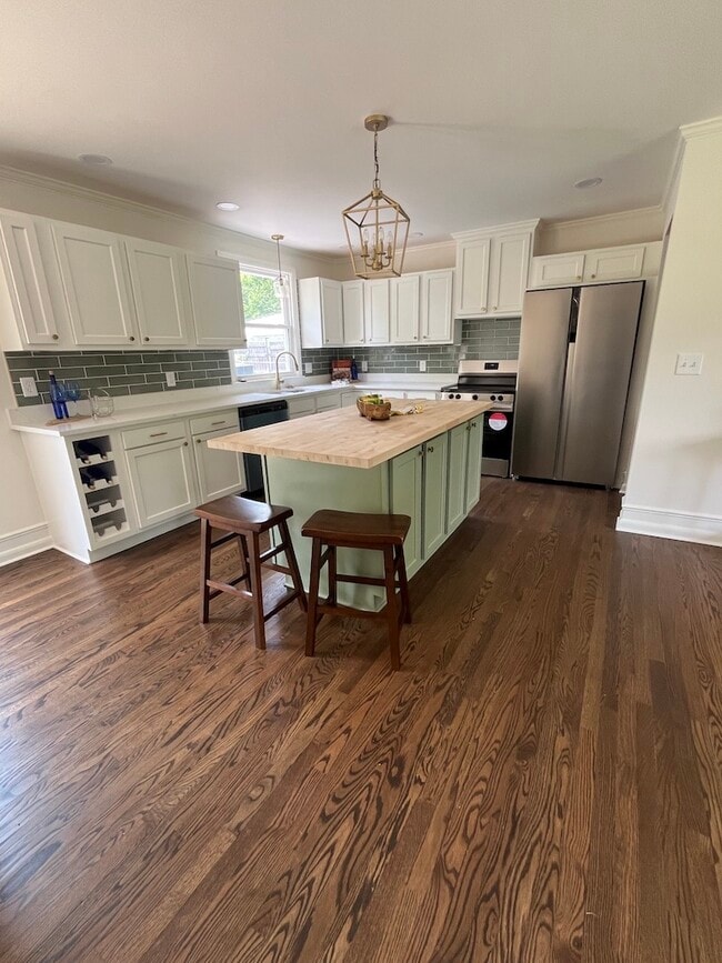 Fully renovated with new appliances, cabinets & counters. Tons of storage & walk-in pantry/laundry - 623 Dunston Dr