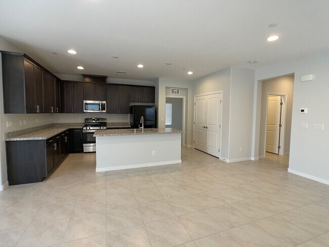 Photo - 4 BED 2 BATH 2 CAR GARAGE SINGLE STORY SINGLE FAMILY HOME w/ PAVED BACKYARD IN CADENCE COMMUNITY,...