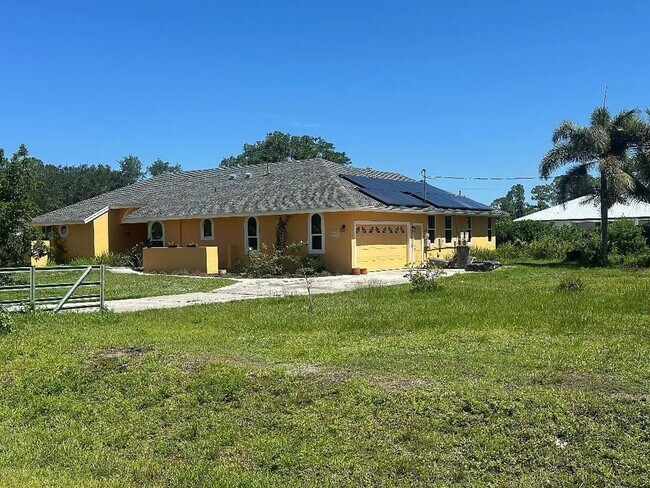 Building Photo - Beautifully Renovated Pool Home in The Acreage - 3bed | 2.5bath