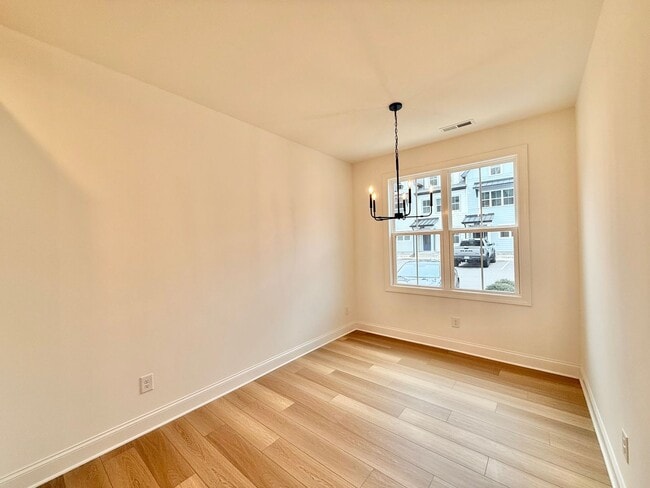 Photo - **OFFERING 1/2 OFF FIRST MONTH'S RENT** Newly Built 4BD, 3.5BA End-Unit Raleigh Townhome in a Gre...