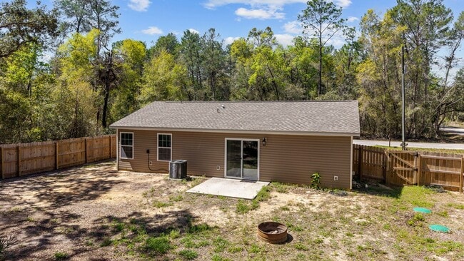 Photo - *** NOT READY FOR SHOW OR MOVE IN UNTIL AUGUST 1 *** Newer 3/2 in the country with fenced yard an...