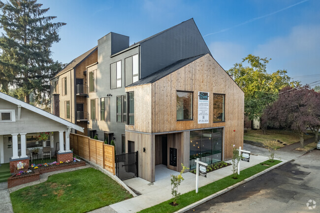 Building Photo - Watts Rowhouses