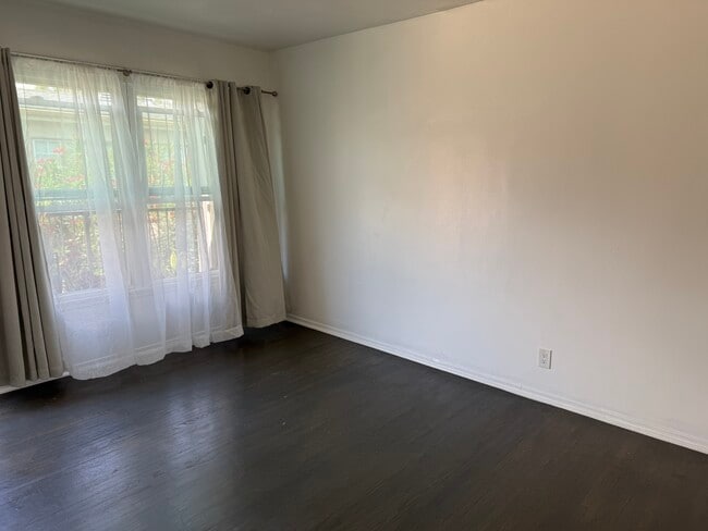 Living Room - Opposite Direction - 6128 De Longpre Ave Unit Apartment 6