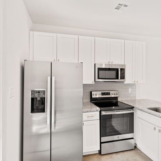 Photo - 1 Bed 1.5 Bath Condo Near Campus! Unit 3