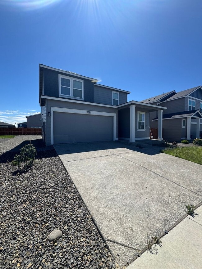 Photo - 4-Bedroom Home with Low-Maintenance Landscaping