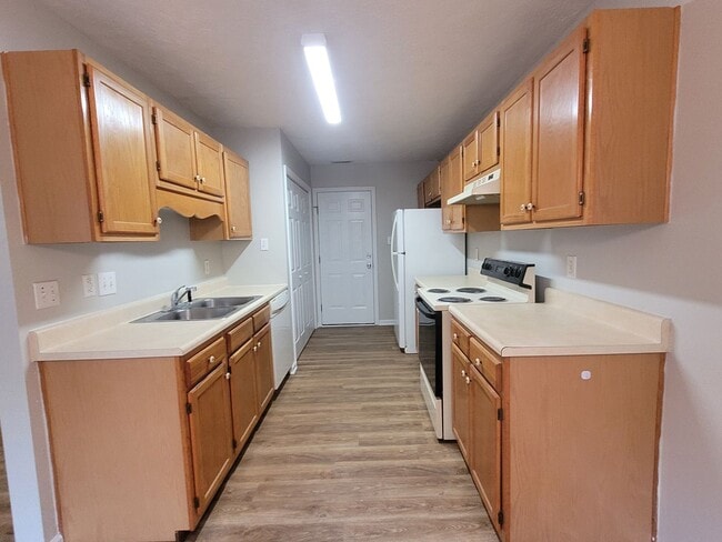 Photo - LVP floors, Large Yard! 3 BRM, 2 BHs, Double Garage!