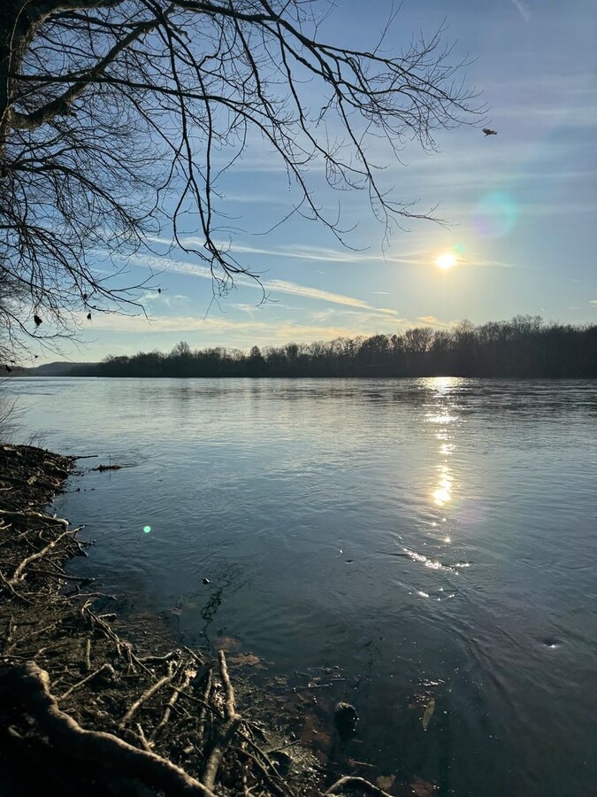 Photo - Riverfront home with parking, laundry, yard, river access