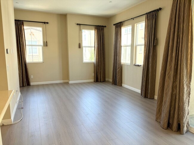 Photo - Stylish 3-Story Townhome with Balcony & Open-Concept Living