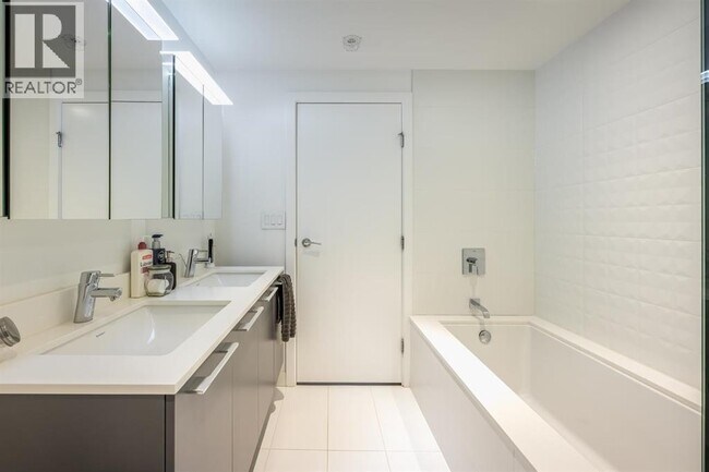 Photo - 2220 Kingsway Unité 18xx