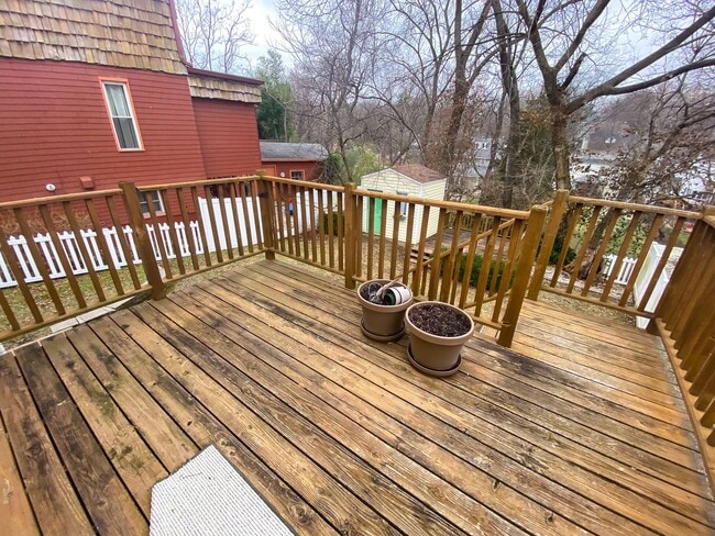 Photo - This classic 3 bedroom 2 bath Webster home features a front porch, large deck off the kitchen for...