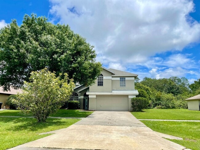 Building Photo - LARGE AND SPACIOUS 4/3 HOME IN WEDGEFIELD GOLF COURSE COMMUNITY