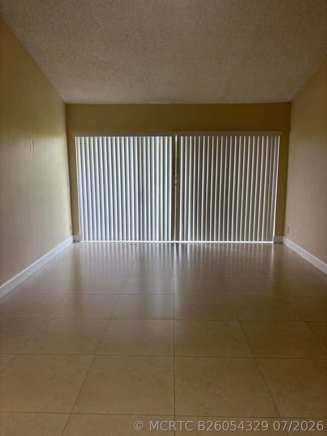 Photo - 8761 Wiles Rd Unit 304