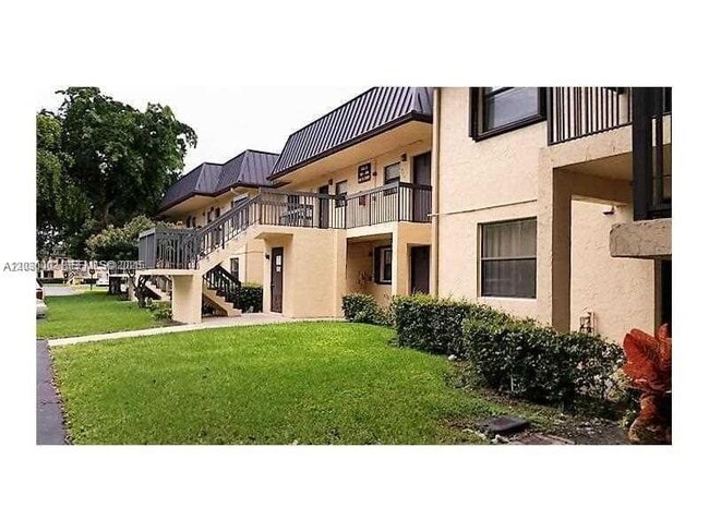 Building Photo - 9117 NW 1st Ct Unit 105