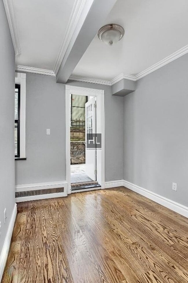 Building Photo - East 25th Street Unit B