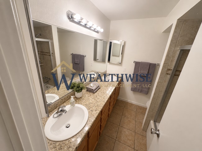 Photo - $750/Month Private bedroom in a 2-Bedroom, 2-Bath Condo | Private Parking Included | Minutes from...