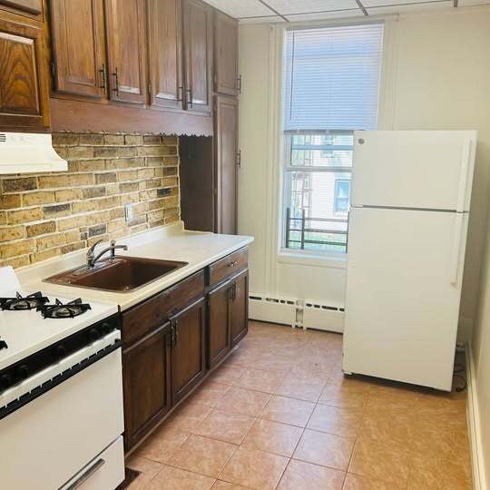Building Photo - 8013 87th Rd Unit 2nd Floor Rental