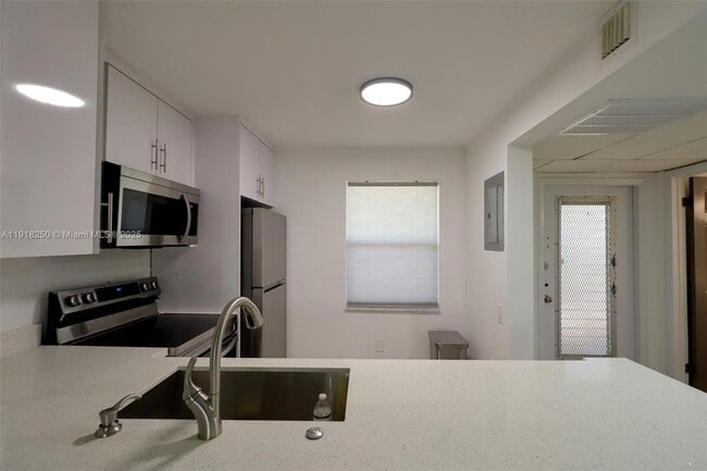 Photo - 9300 Lime Bay Blvd Unit 102