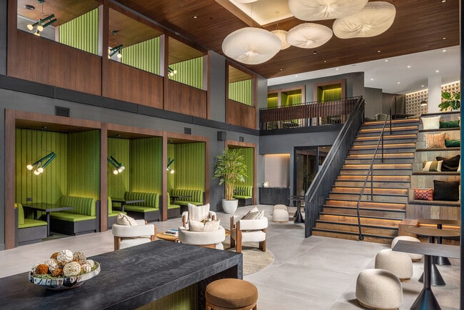 Expansive clubroom with high-end finishes and sophisticated furnishings