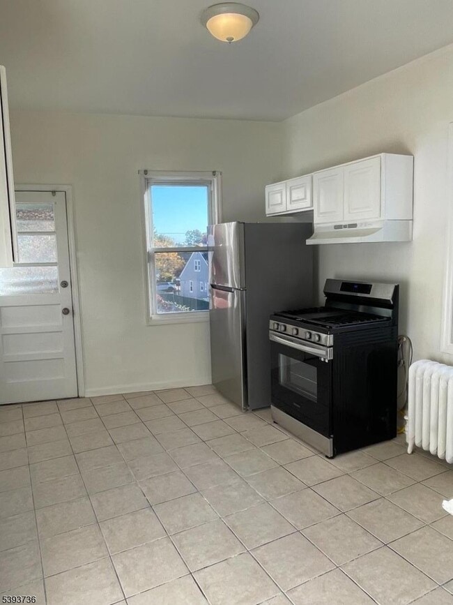 Building Photo - 1116 Walnut St Unit 2