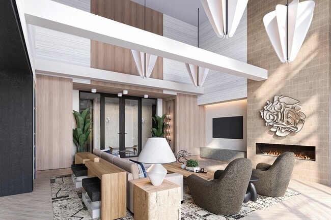 Cozy yet contemporary, this stylish clubroom makes it easy to relax, catch up with neighbors, or enjoy a quiet night in - The Residence Peninsula Apartments