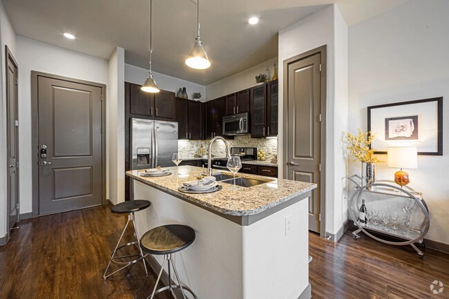Building Photo - One Month FREE – Your New Home Awaits! Unit AF2