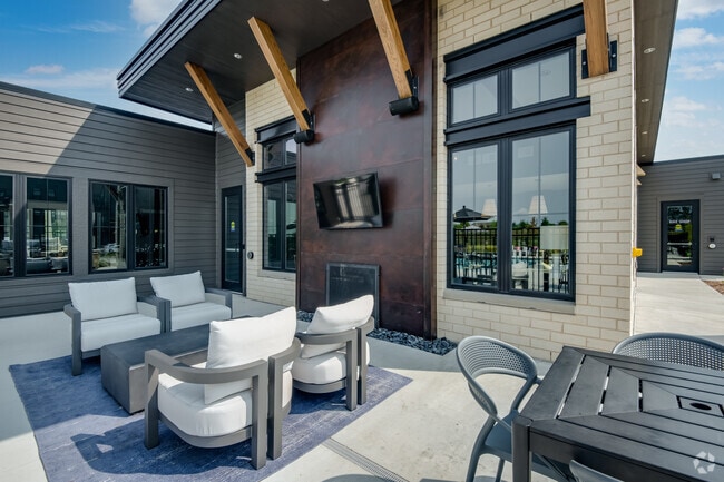 Outdoor Sundeck with Fireplace | Velo Village | Apartment in Franklin WI