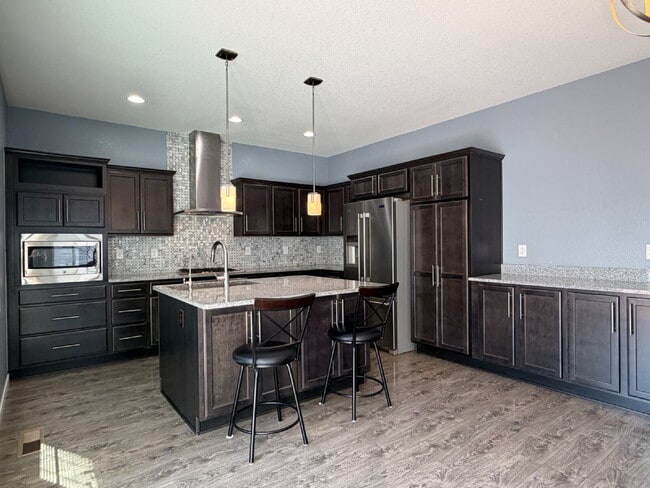 Photo - Georgous Three Bedroom Home in Reunion with Private Office, Loft & Chef’s Kitchen!
