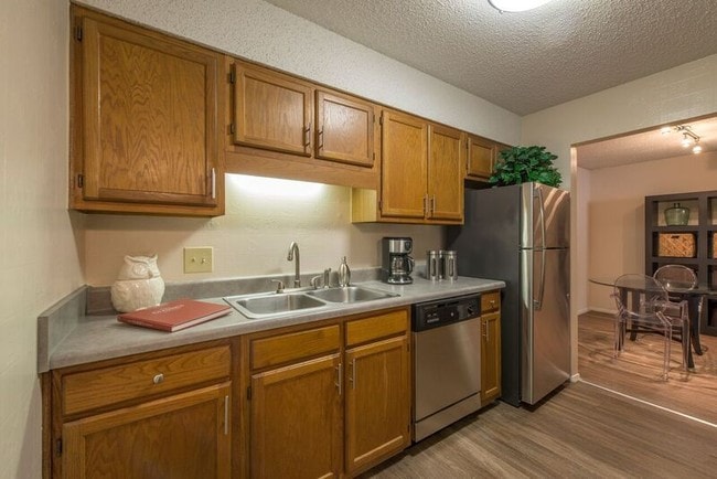 Kitchens include Premium appliances - including multi-cycle dishwashers, Dual basin stainless steel - Royal Oaks Apartments