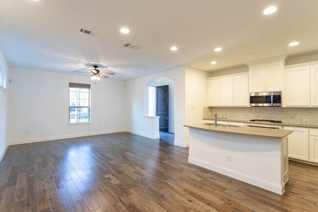 Photo - Two story townhome with 2 car garage on an...