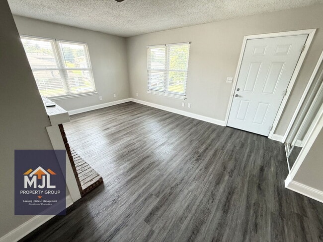 Photo - Renovated 2 Bedroom/ 1 Bath Apartment with Garage *READY NOW* Unidad D