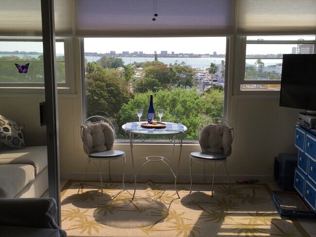 patio table water view - 33 S Gulfstream Ave Unit 704A