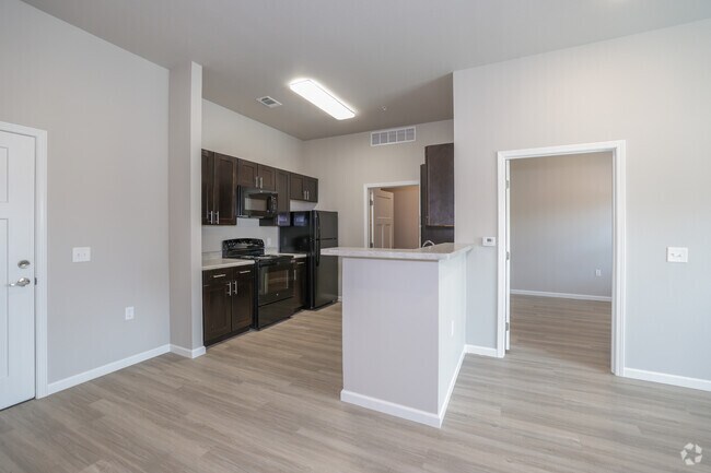 2BR, 1BA - 873SF - Kitchen and Dining Area
