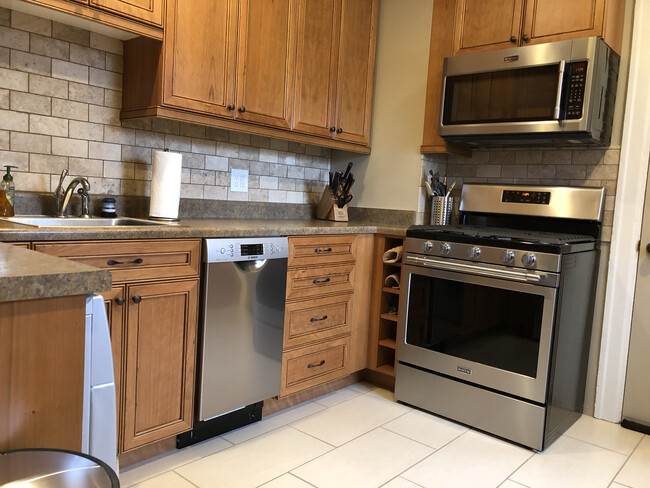 Newly updated kitchen - 1704 E 16th Ave Townhome