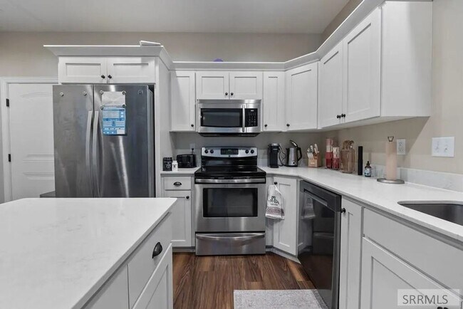 Photo - Beautiful 3-Bed, 2.5-Bath Rock Creek Townhome with Attached 2-Car Garage